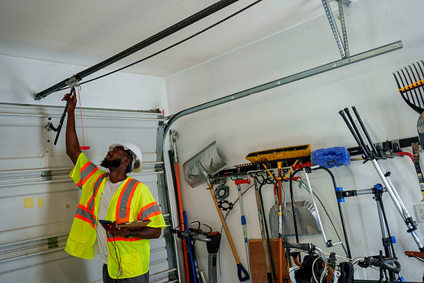 Professional Garage Door Roller Replacement technician working in Roscommon, MI